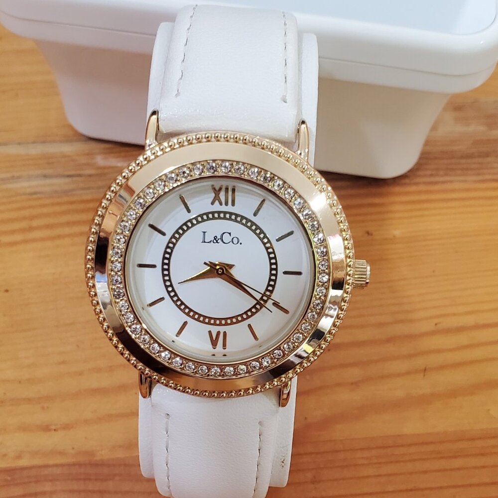 NEW  Watch L & Co. Timepieces White Band Gold Face & Jewels
